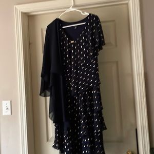 I navy blue dress with a matching shaw.